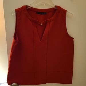 Deep red sleeveless blouse